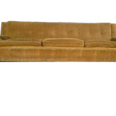 Brown tufted sofa