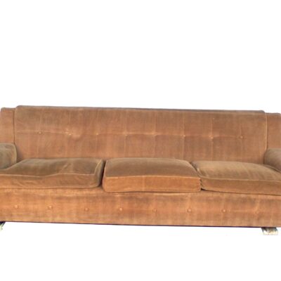 Brown tufted sofa