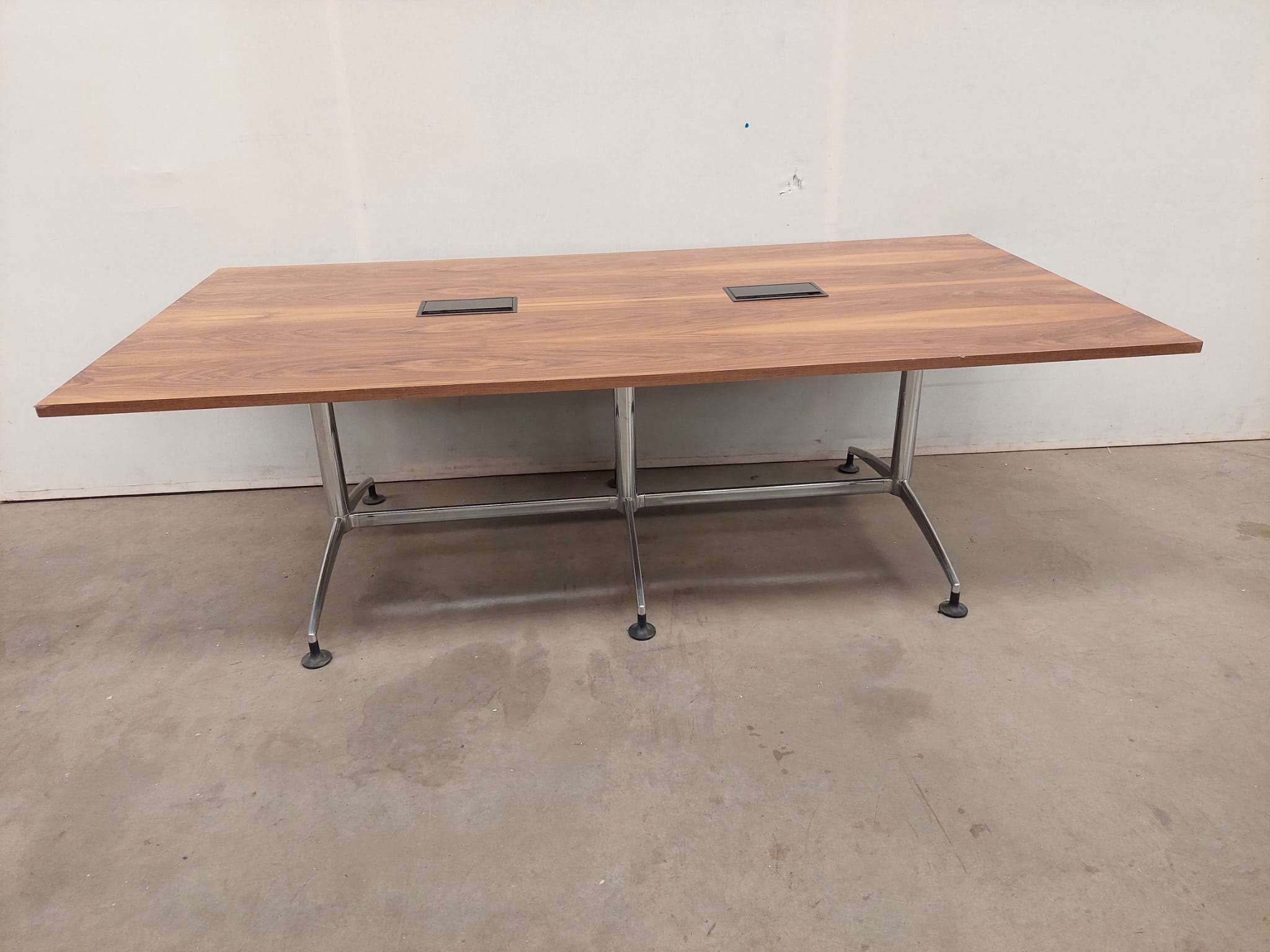 Boardroom table with wooden top and chrome legs