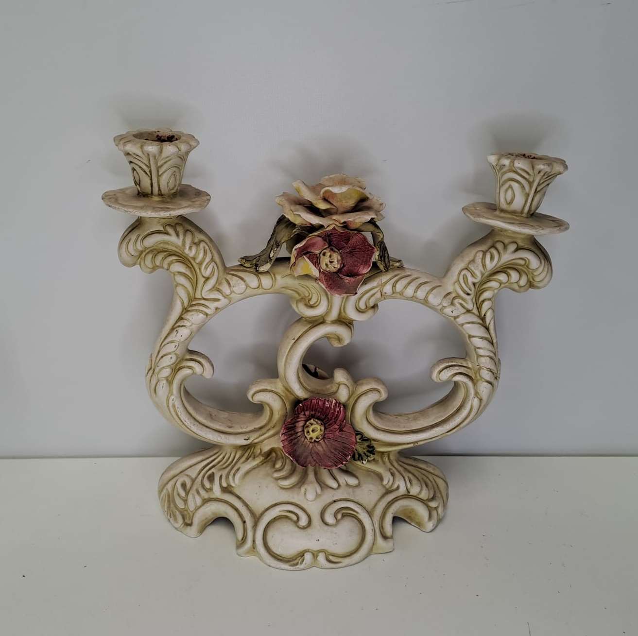 Two-candle porcelain candelabra.