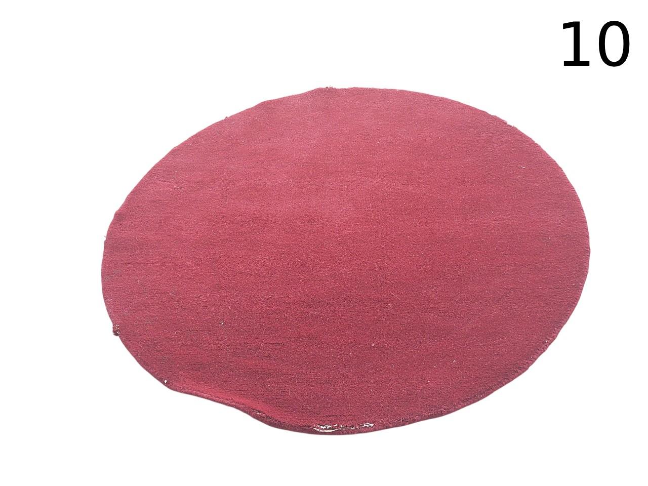 Alfombra redonda de algodón tejido plano en color granate alquiler para eventos, publicidad, peliculas y series