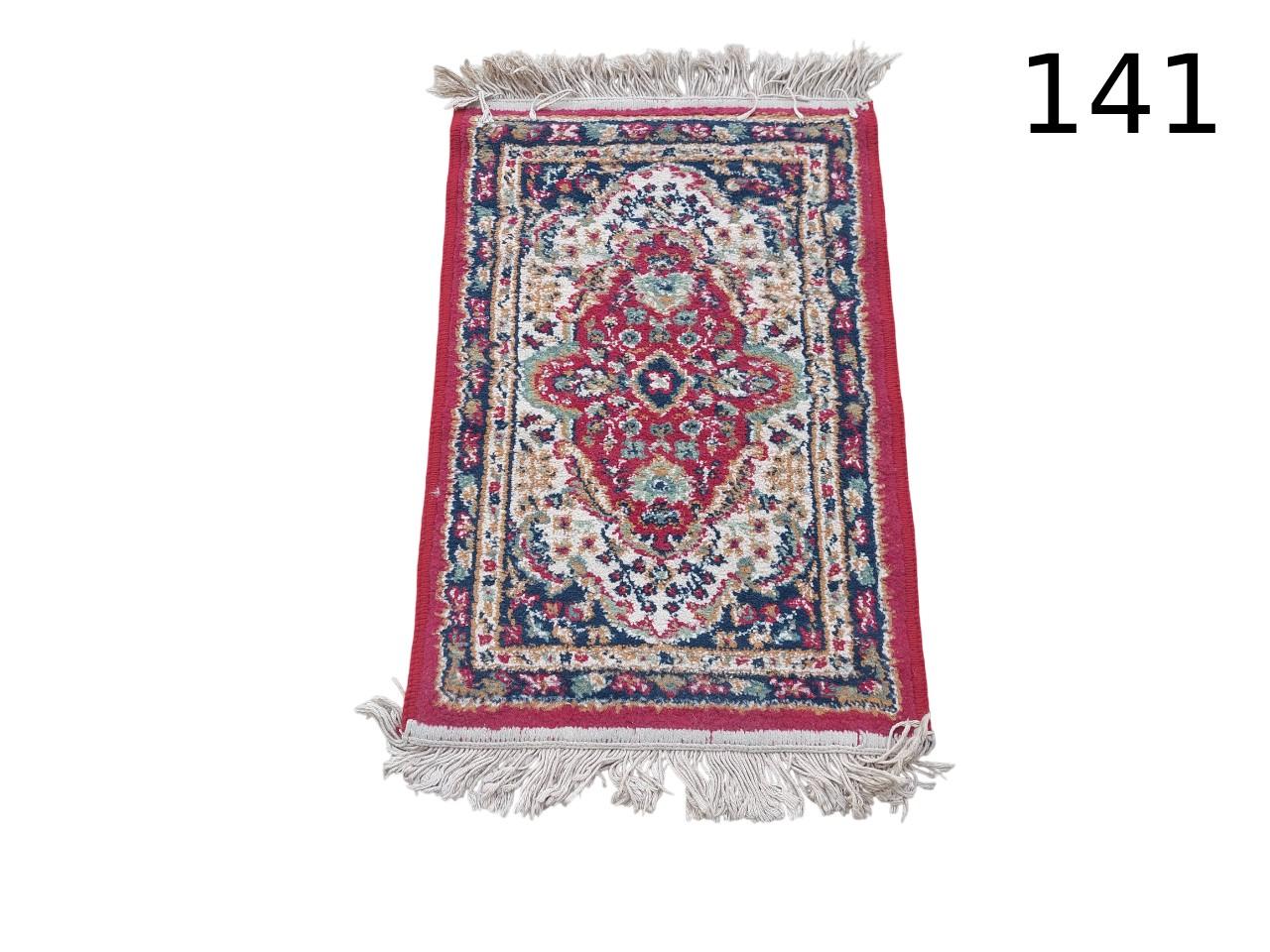 Miniature Persian style carpet with floral design and fringes for rent for events, advertising, films and series.