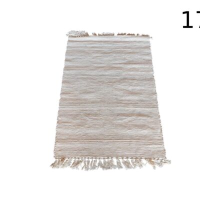 Alfombra es la House Doctor Hafi de color beige con flecos decorativos en los extremos alquiler para eventos, publicidad, peliculas y series