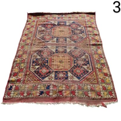 Vintage tribal style Kilim rug with geometric patterns in red and blue tones for rent for events, advertising, films and series.