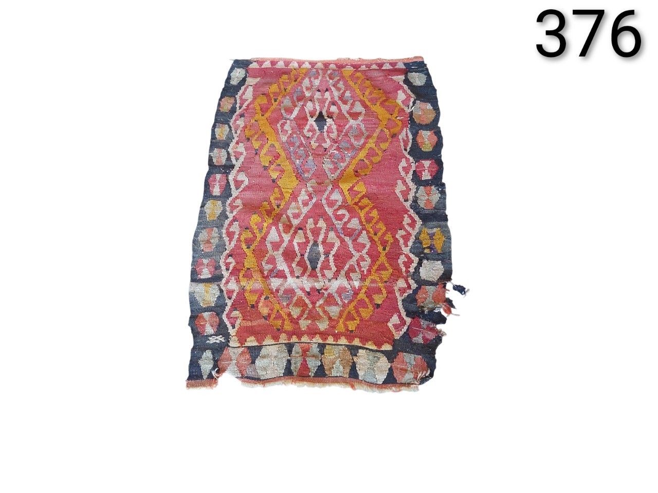 Vintage Berber rug from Boujad, Morocco, with geometric design and vibrant colours for rent for events, advertising, film and series.