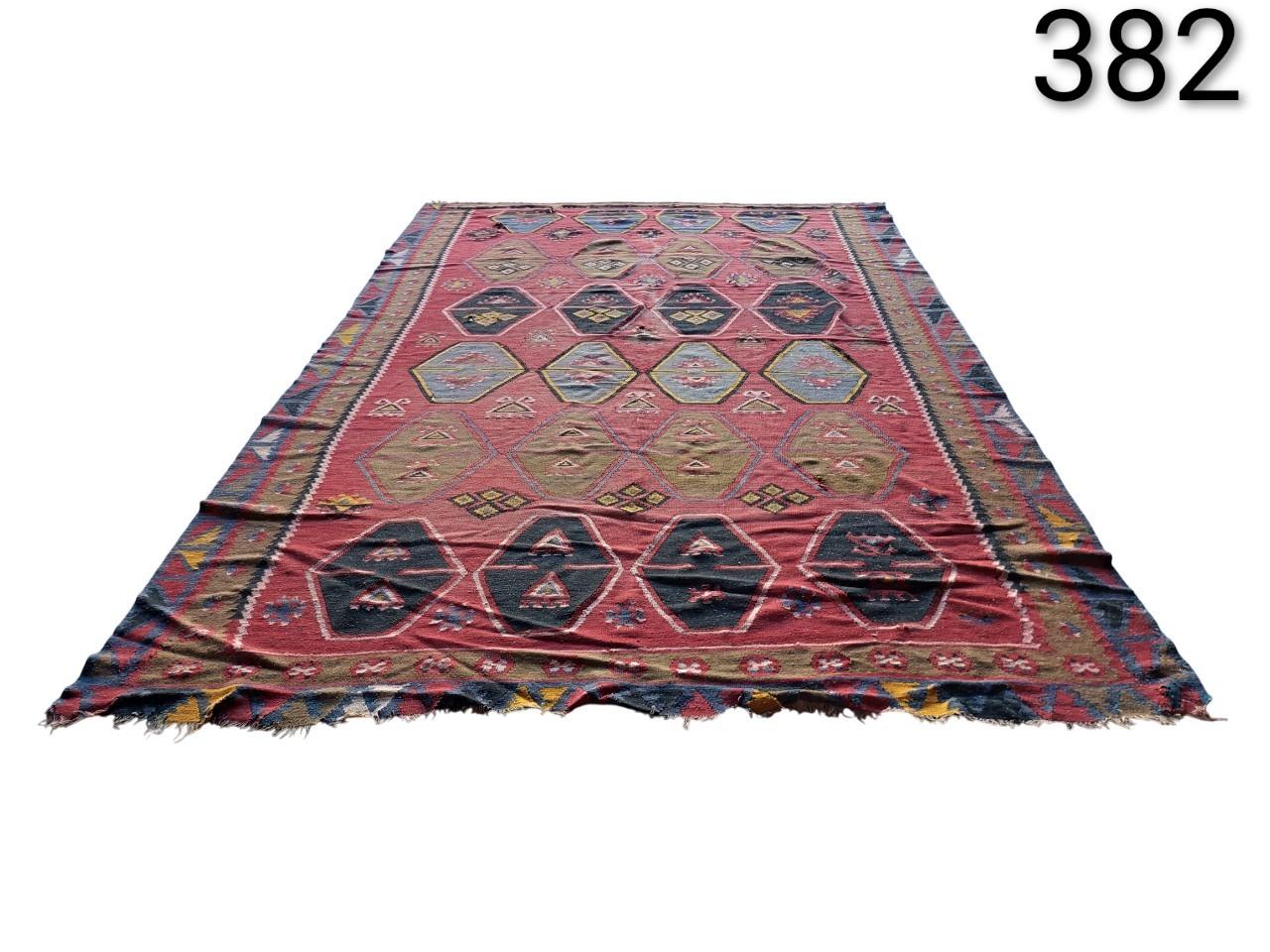 Carpet is a vintage kilim from Sivas, handwoven about 60-70 years ago in Turkey for rent for events, advertising, films and series.