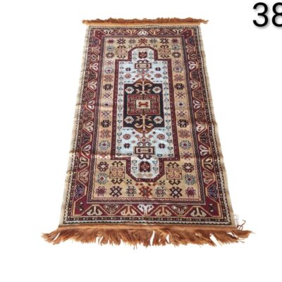 Carpet is an authentic Persian hand knotted kilim with traditional geometric motifs for rent for events, advertising, films and series.