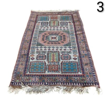 Hand knotted carpet with a traditional geometric design for rent for events, advertising, films and series.