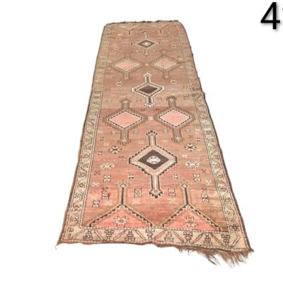 Traditional Turkish wool corridor carpet with geometric design and medallions for rent for events, advertising, films and series.