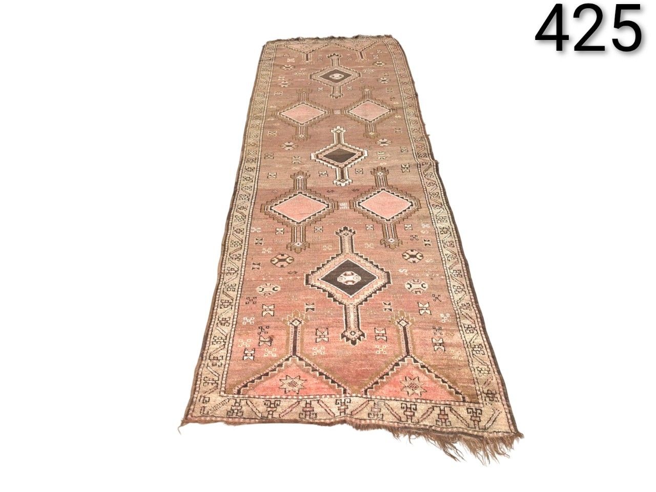 Traditional Turkish wool corridor carpet with geometric design and medallions for rent for events, advertising, films and series.