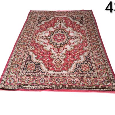 Classic Persian design carpet in red colour for rent for events, advertising, films and series.