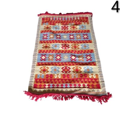 Hand-woven wool Kilim rug with traditional geometric patterns for rent for events, advertising, films and series.