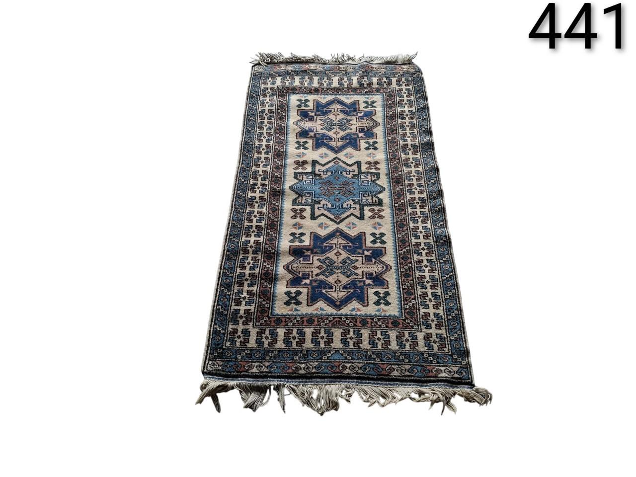 Rectangular oriental or oushak style rug with a traditional central medallion design and floral borders in beige and brown tones for rent for events, advertising, films and series.