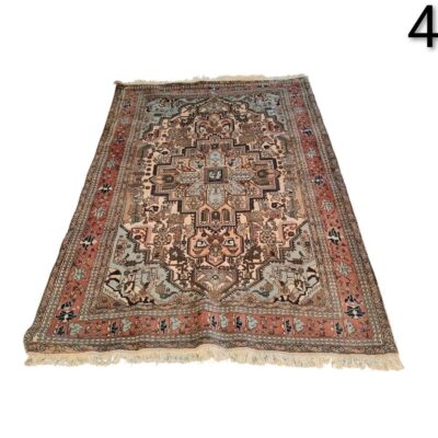 Heriz style vintage Persian rug with an intricate geometric pattern in shades of brown, beige and blue for rent for events, advertising, films and series.