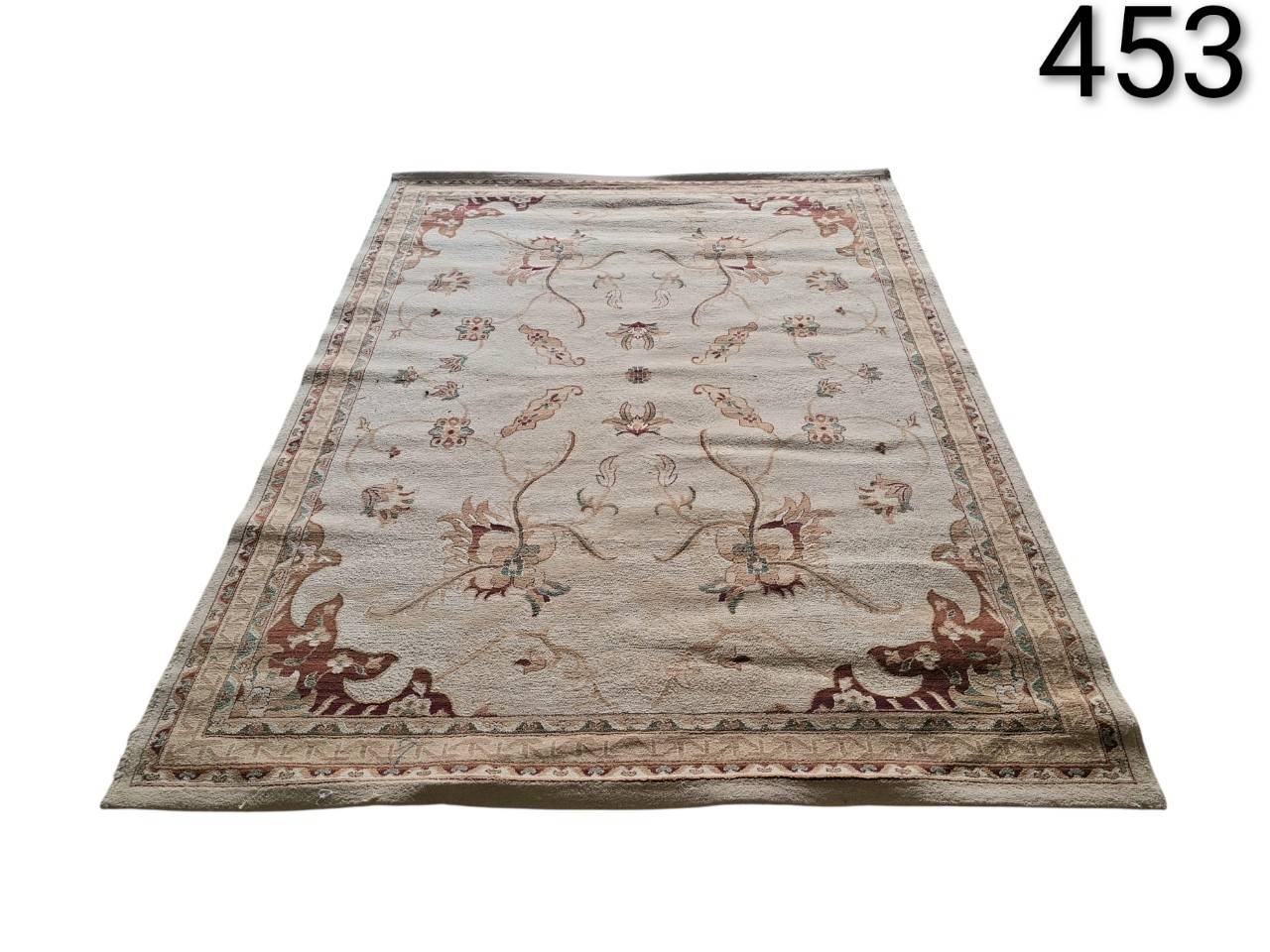Vintage Oushak type carpet with a floral design in beige, red and green tones for rent for events, advertising, films and series.