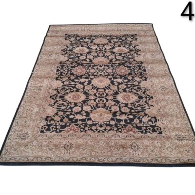 Alfombra de diseño Sadraa anudada a mano con patrones florales orientales en tonos negro y beige alquiler para eventos, publicidad, peliculas y series