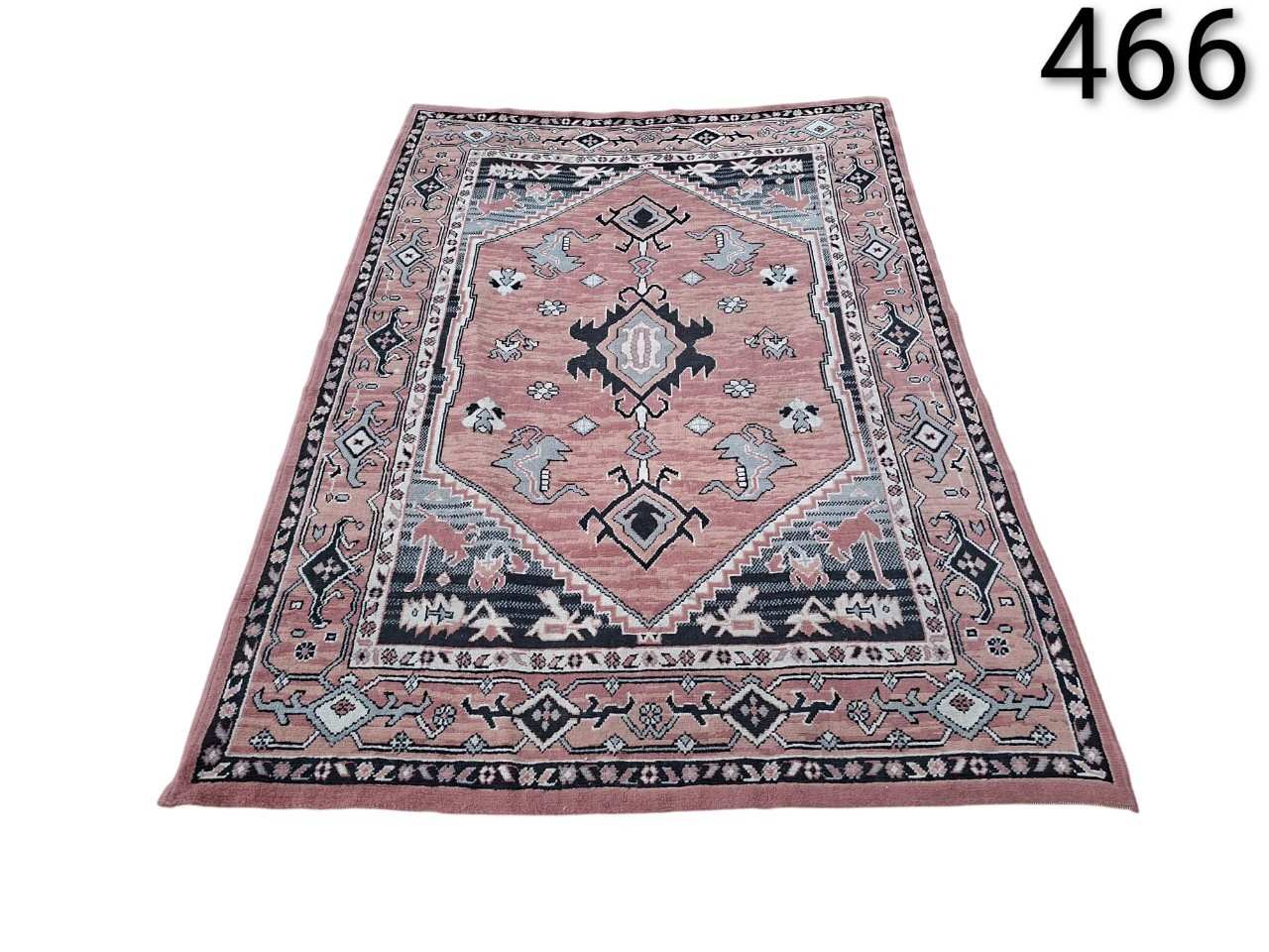 Alfombra de lana vintage estilo turco con un diseño geométrico en tonos rosa y azul alquiler para eventos, publicidad, peliculas y series