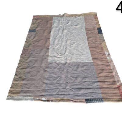 Rug is a vintage style patchwork rug in brown colour for rent for events, advertising, movies and series.