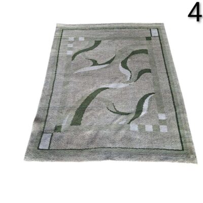 Hand knotted oriental rug from Nepal in beige and green tones with an abstract design for rent for events, advertising, films and series.