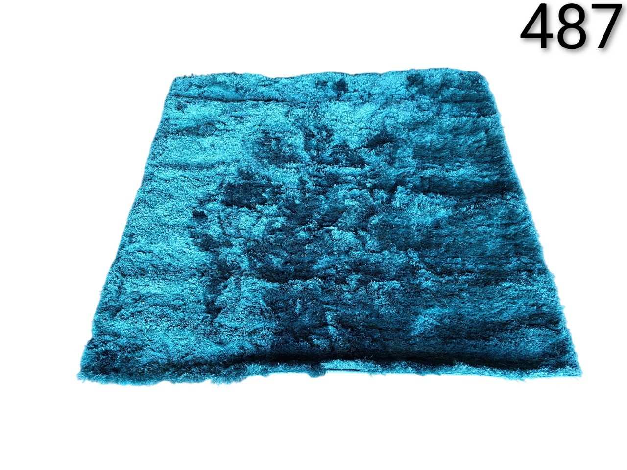 Benuta Whisper long pile carpet in turquoise colour for rent for events, advertising, movies and series.