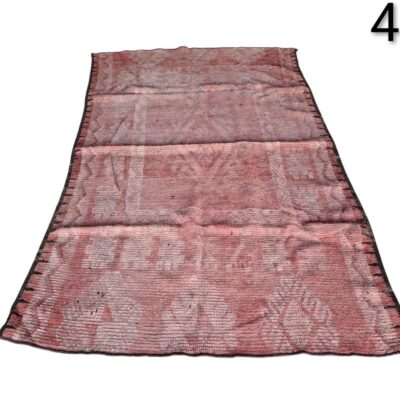 Vintage pink and brown carpet with a worn look for rent for events, advertising, films and series.