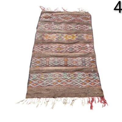 Vintage hand-woven Kilim rug with traditional geometric motifs for rent for events, advertising, film and series.