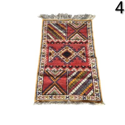 Traditional handmade Turkish Kilim rug, possibly made of wool and with a vintage geometric design for rent for events, advertising, films and series.