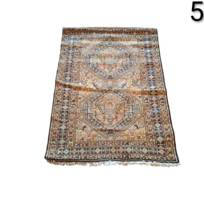 Vintage turkish runner rug with traditional geometric patterns and brown tones for rent for events, advertising, film and series.