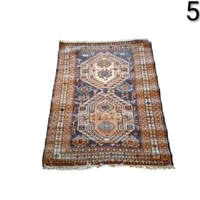 Carpet appears to be a vintage piece of wool, possibly of Turkish, Persian or Caucasian origin, characterised by its intricate geometric patterns rented for advertising, films and series.