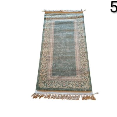 Green vintage style corridor carpet with fringes for rent for events, advertising, movies and series.