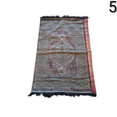 Muslim prayer rug with an intricate traditional Islamic design in shades of brown and black for hire for events, advertising, films and series.