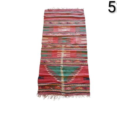 Turkish wool kilim carpet with colourful geometric patterns for rent for events, advertising, films and series.