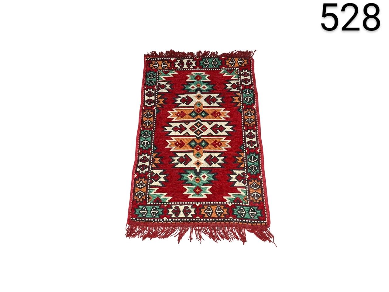 Turkish handmade Kilim rug with geometric patterns in red, green and white for rent for events, advertising, films and series.