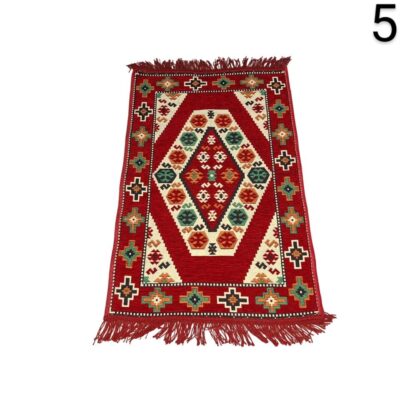 Turkish hand-woven wool Kilim rug with traditional geometric patterns in red tones for rent for events, advertising, films and series.