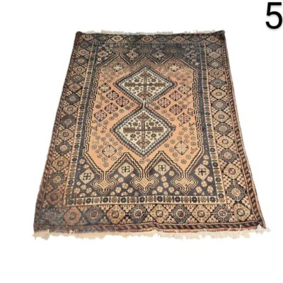 Ersari carpet of Afghan tribal design with geometric patterns in beige and brown tones for rent for events, advertising, films and series.