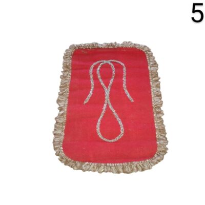 Red prayer mat with golden edges, often used in religious contexts such as for idols of deities or altars, rental for events, advertising, films and series.