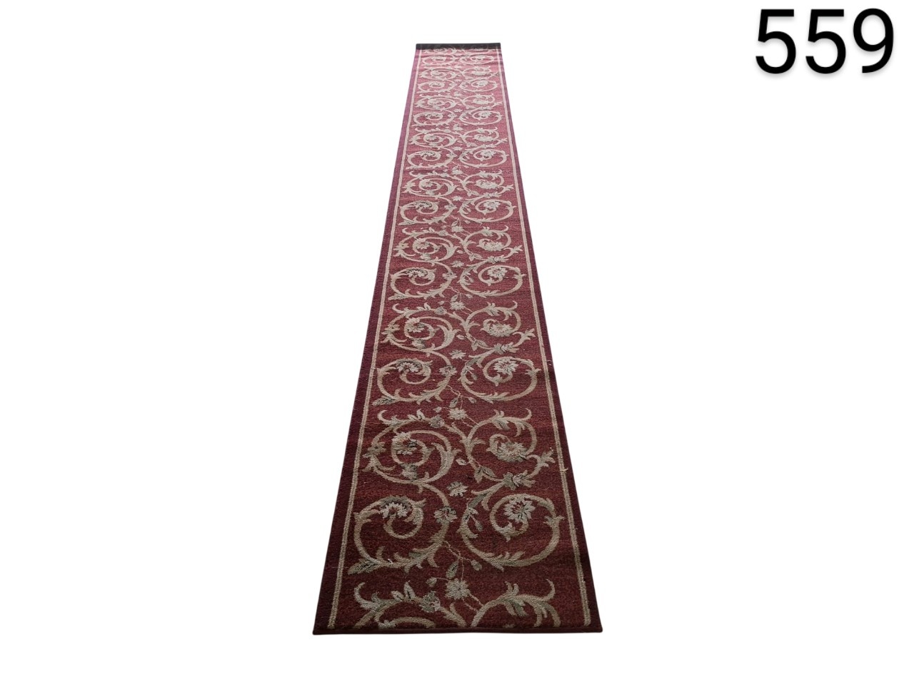 Hallway carpet with a classic oriental design in maroon and beige colours for rent for events, advertising, films and series.