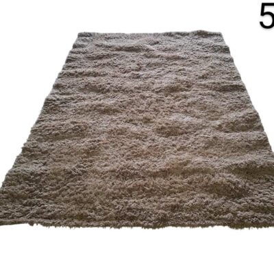 Long pile shaggy carpet in beige or taupe for rent for events, advertising, movies and series.