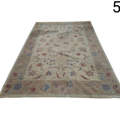 Hand-woven antique portuguese needlepunched carpet with floral design for rent for events, advertising, films and series.