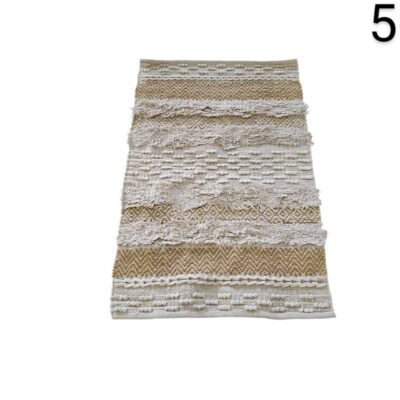 Bohemian style rug in beige and natural tones, generally made of a mixture of cotton and jute, for rent for events, advertising, films and series.