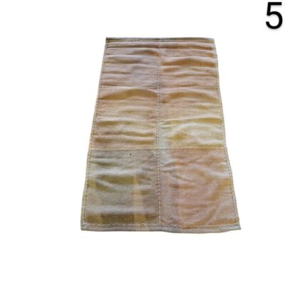 Handmade rustic style dhurrie rug in neutral tones for rent for events, advertising, films and series.