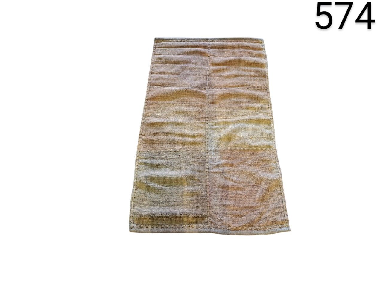 Handmade rustic style dhurrie rug in neutral tones for rent for events, advertising, films and series.