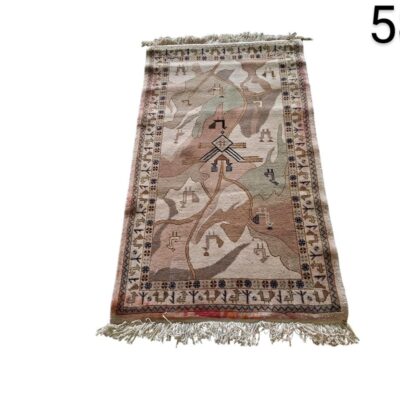 Vintage Turkish style wool rug with geometric patterns in beige and brown tones for rent for events, advertising, films and series.