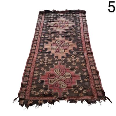 Vintage kilim type rug made of wool with a geometric design for rent for events, advertising, films and series.