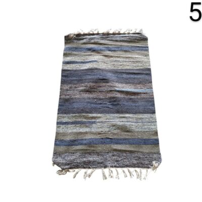 Lotus Home carpet in the model Surrey Denim, characterised by its stripes in blue and grey tones, for rent for events, advertising, films and series.