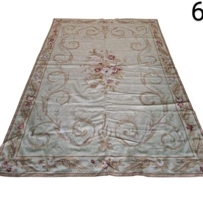 Aubusson French style wool carpet with classic floral design in beige and pink tones for rent for events, advertising, films and series.