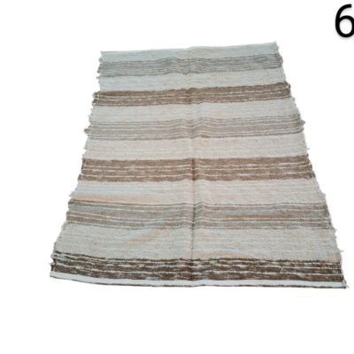 Rectangular Morena rug made of jute and wool in brown and beige tones for rent for events, advertising, films and series.