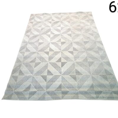 Grey and white rectangular carpet with a geometric pattern of squares and triangles for rent for events, advertising, films and series.