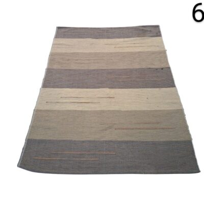 Rectangular nanimarquina rug from the Tres Stripes collection with a design of horizontal stripes in neutral and greyish tones for rent for events, advertising, films and series.
