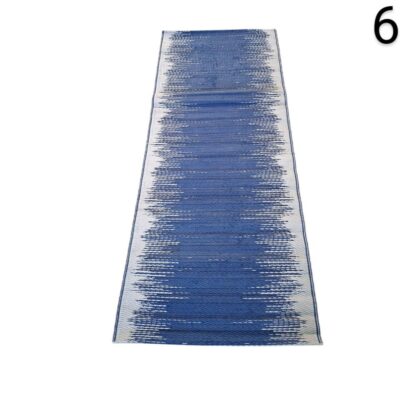 Corridor style carpet, probably from Safavieh's Cabo collection, with an abstract geometric design in blue and white, for rent for events, advertising, films and series.